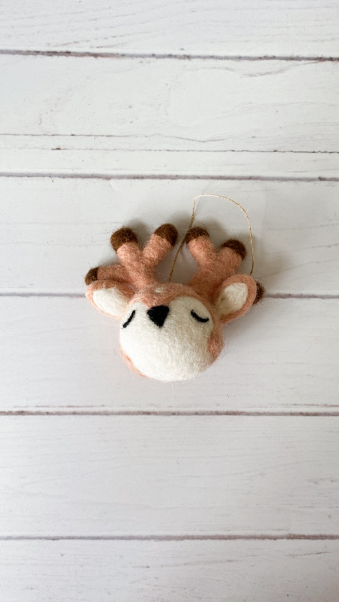 Sleepy Reindeer Christmas ornament